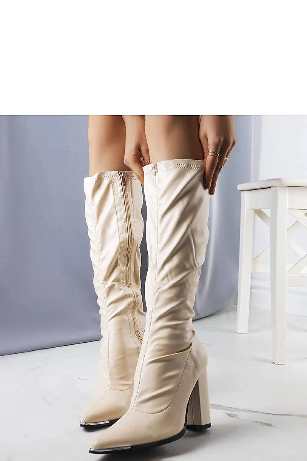 Beige pointed nose heel boots