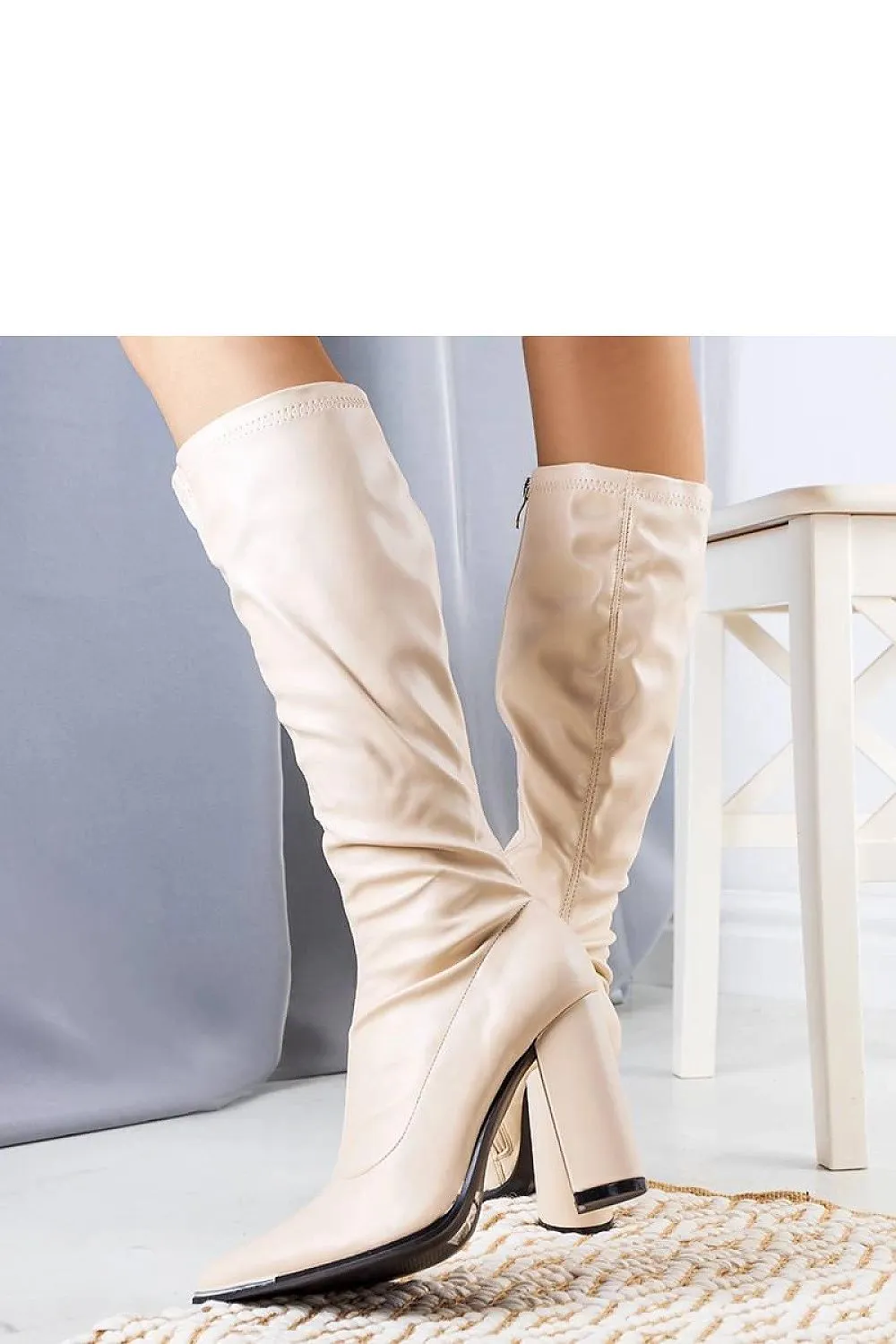 Beige pointed nose heel boots