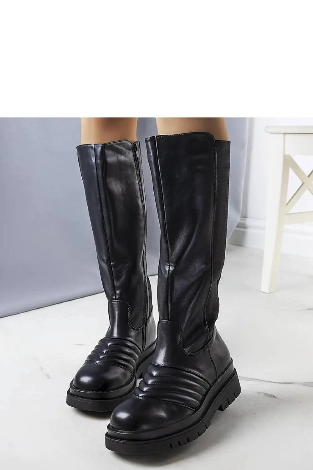 Elegant eco-leather black boots